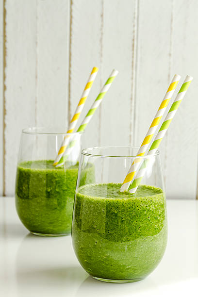 Green Spinach Kale Detox Smoothie stock photo