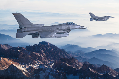 Figher jets flying over the mountains