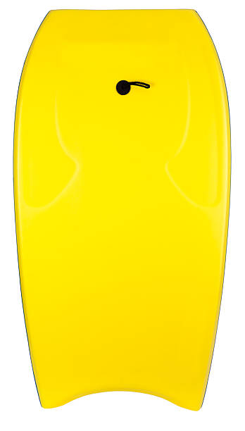 Boogie Board Boogie or body board. Yellow. White background. Vertical. body board stock pictures, royalty-free photos & images