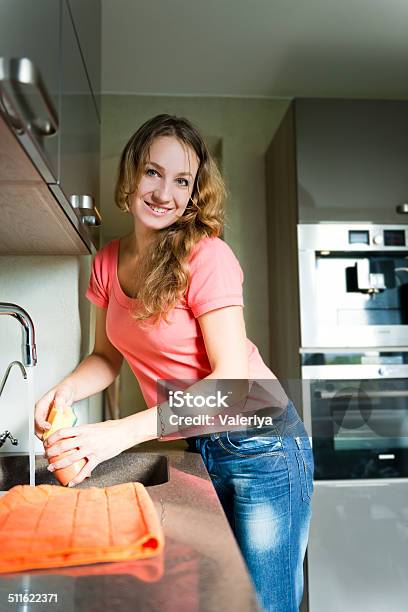 Happy Young Woman Washing Cup Kitchen Dishwashing Stock Photo - Download Image Now