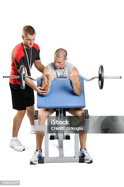 Athlete Men Exercising With Personal Fitness Trainer Stock Photo - Download Image Now