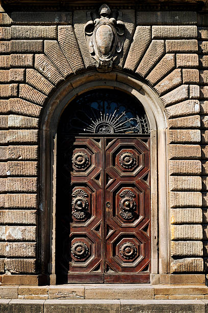 istock Beautiful, Old wooden arch double doors 511624655