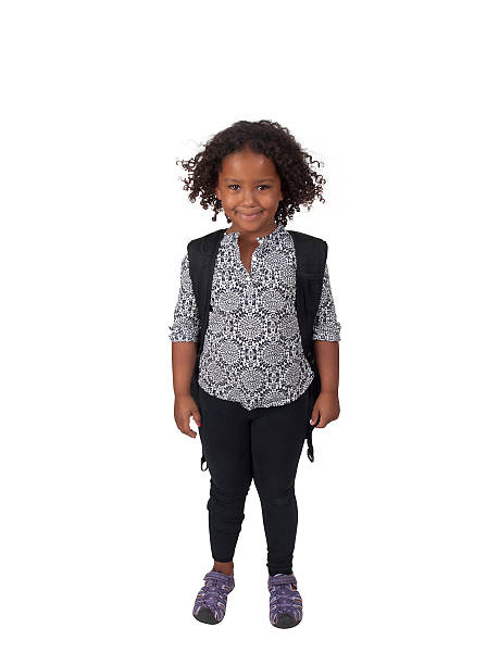 Mixed race girl with back pack stock photo