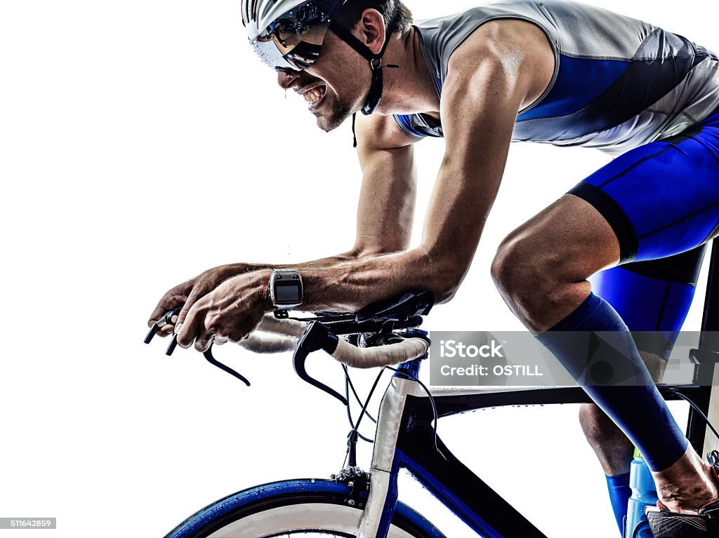 man triathlon iron man athlete cyclist bicycling man triathlon iron man athlete biker cyclist bicycling biking in silhouette on white background Cycling Stock Photo