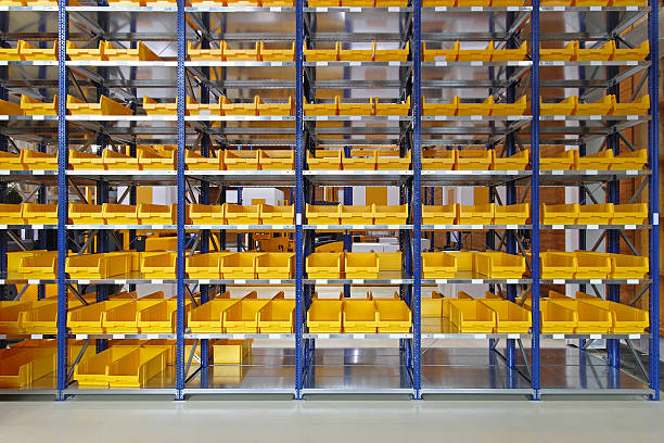Storage bins Storage trays and bins in distribution warehouse filing tray stock pictures, royalty-free photos & images