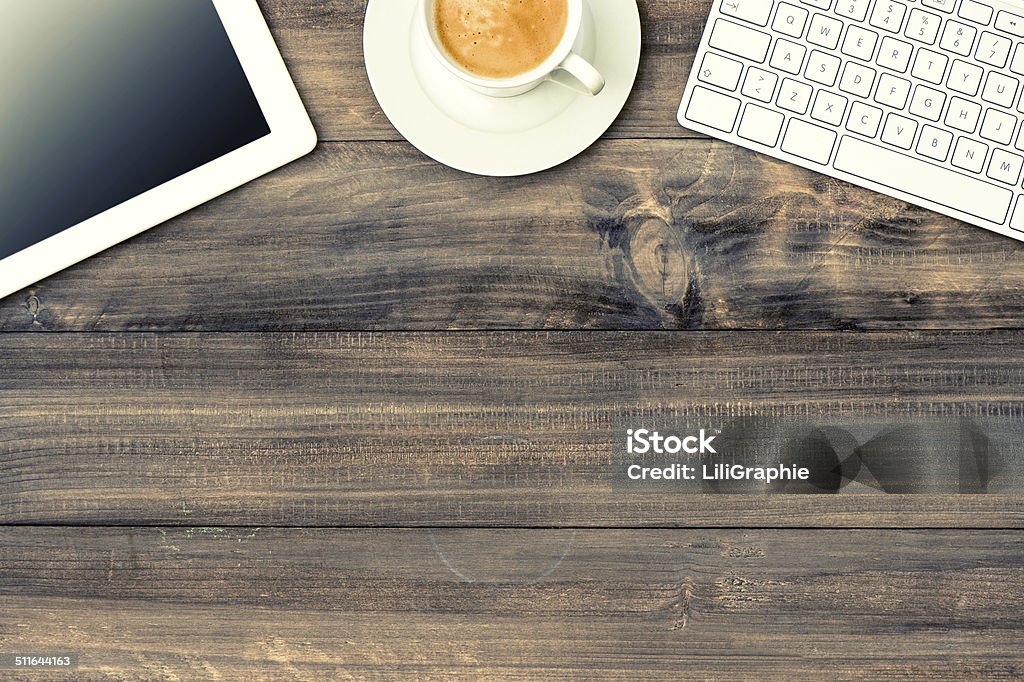 digital tablet pc, keyboard and cup of coffee digital tablet pc, keyboard and cup of coffee on wooden table Backgrounds Stock Photo