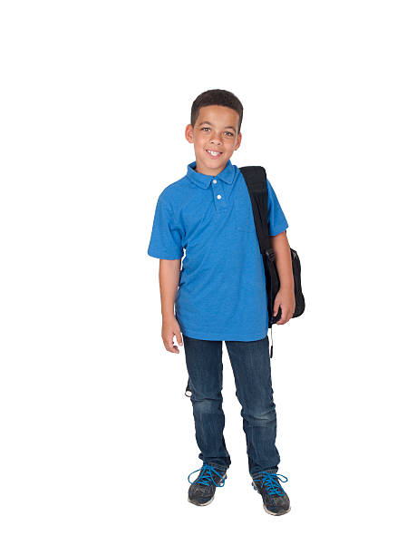 Mixed race boy with back pack stock photo