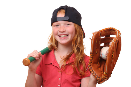 Happy red haired baseball girl on white background