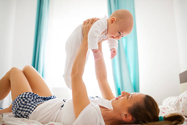 istock Mom playing with baby 511645671