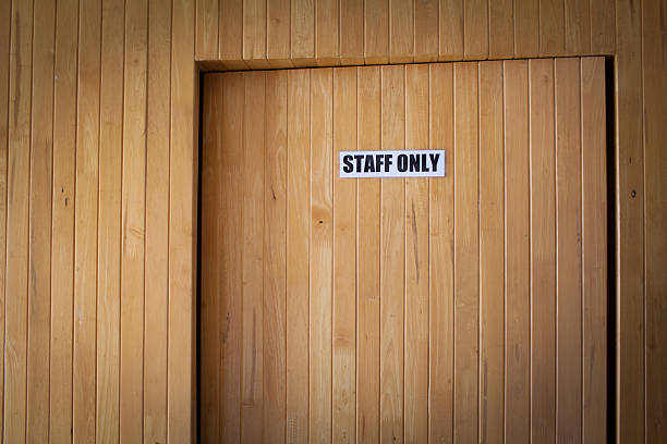 istock staff only door sign workplace office 511647409