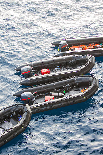 istock Life boats in the sea for help and support people 511647921