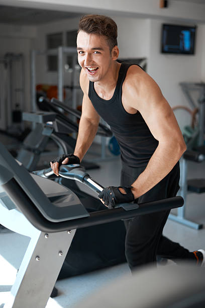 istock athlete exercising on a stationary bike 511648095