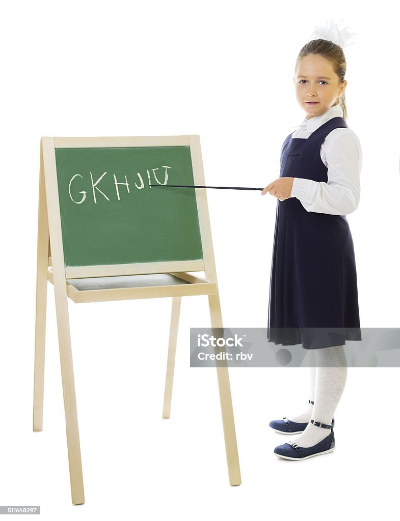 Little schoolgirl with blackboard isolated Little schoolgirl with blackboard isolated on white 4-5 Years Stock Photo