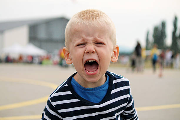 Boy is shouting Little boy in outdoor sulking stock pictures, royalty-free photos & images