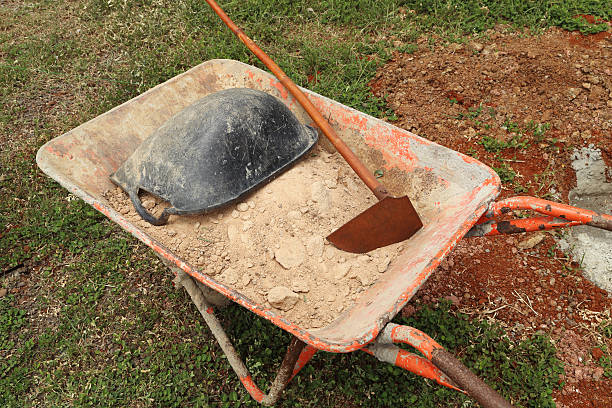 istock old wheelbarrow with sand and equipment 511650031