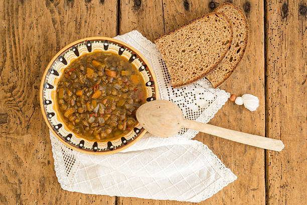 lentil soup over vintage rustic table