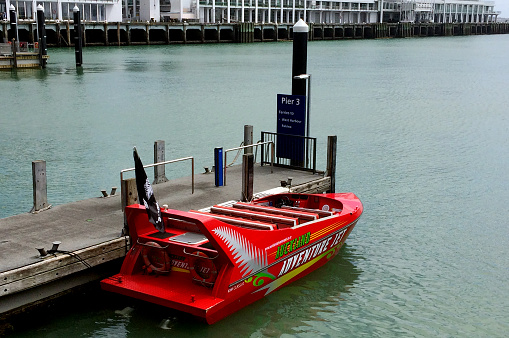 Auckland, New Zealand - October 25, 2015: Auckland Adventure Jet. Built in the South Island, New Zealand by Kwikkraft powered by twin 300HP Volvo jet engines, making it the fastest jet boat ride in Waitemata Harbour.