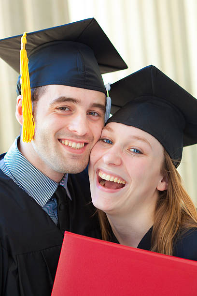 istock Portrait of Happy Smiling Graduating Students 511655492