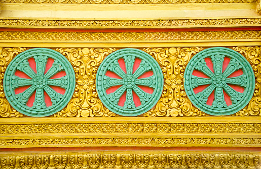 Floral art on the wall of Khmer Buddhist temple in Vietnam