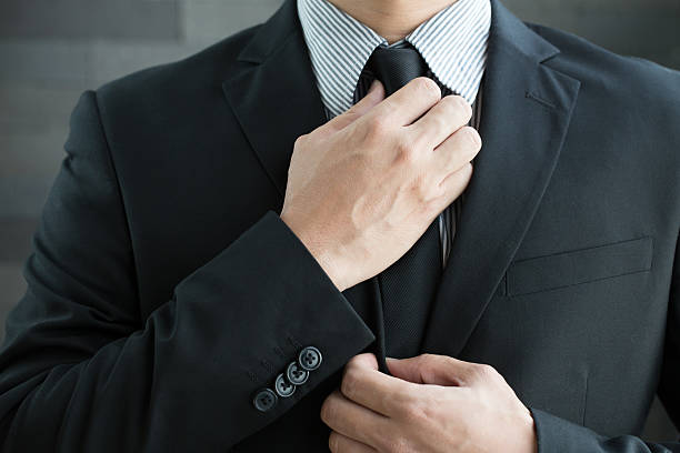 istock Businessman in suit and tie necktie 511658918