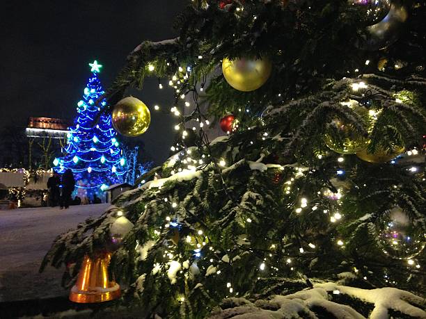istock Christmas Trees with Lights and Decorations in Moscow. 511665624