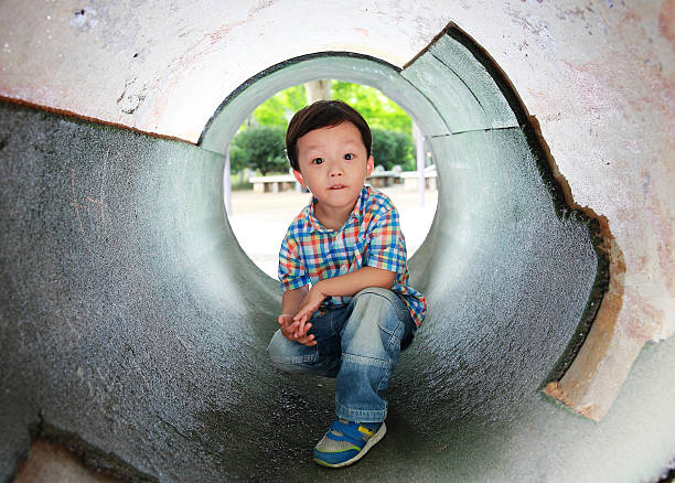 istock Cute children playing in the park 511665705