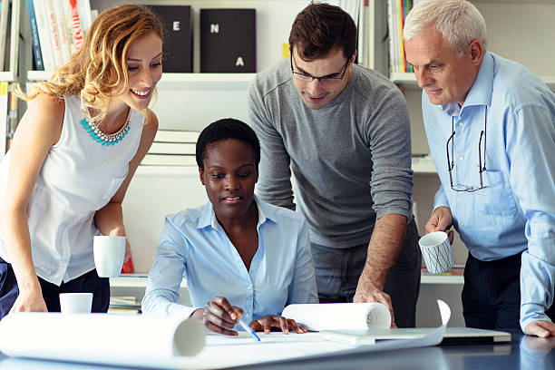 istock Multi-Ethnic Group of architects Have Meeting. 511665761