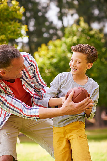 istock Showing off his football skills 511666312
