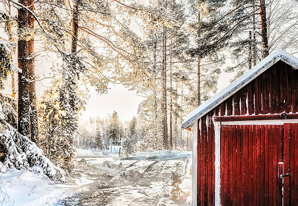 istock Winter landscape house, road and sunlight 511667184