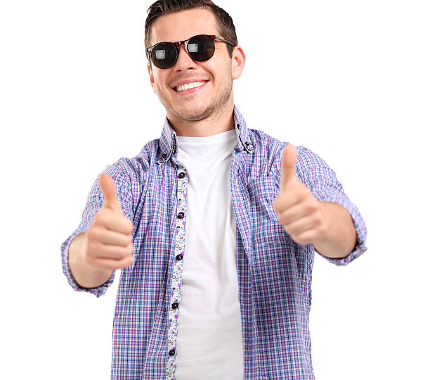 istock young casual man showing the thumb up gesture 511668403