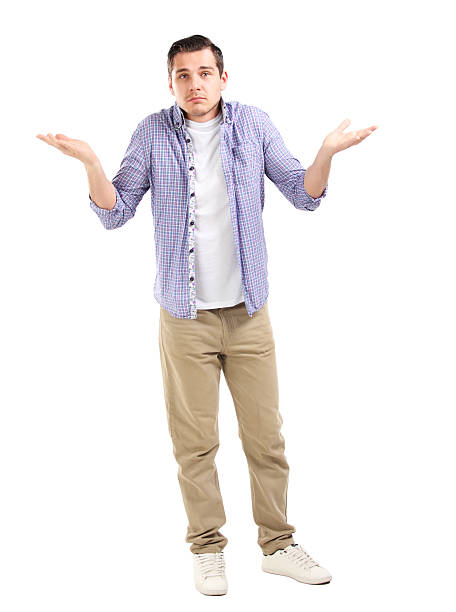 istock angry unhappy young man, arms out asking what's the problem 511668823