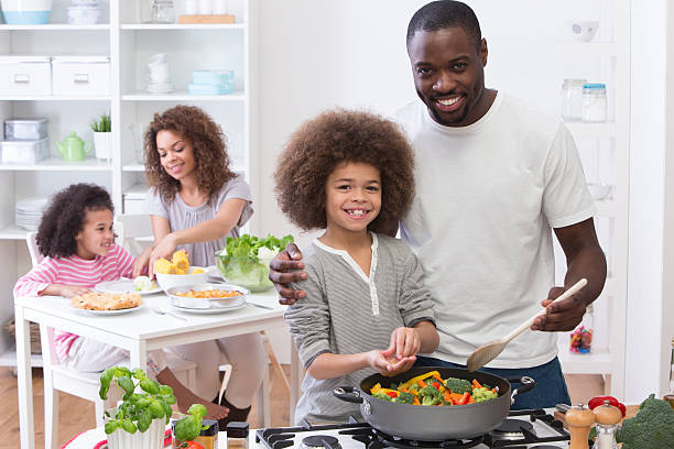 istock Males Cooking Family Meal 511668949