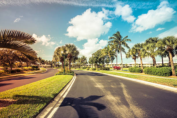istock Gated community road and condominiums in Florida 511669070