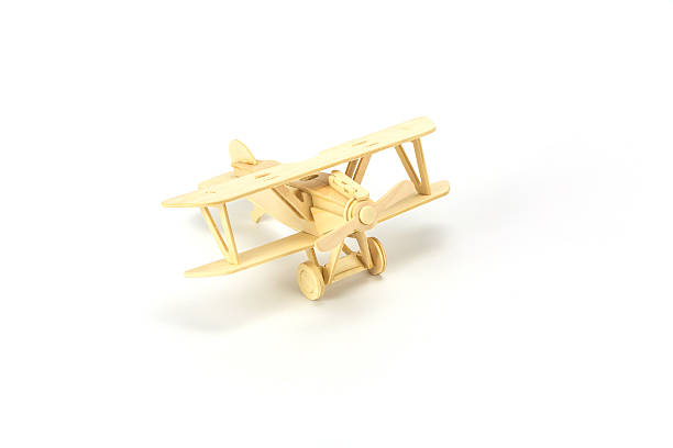 istock Wooden airplane model isolated on white background 511669286