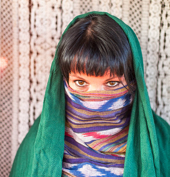 istock Caucasian young woman brunette covers her face with a veil. 511669867