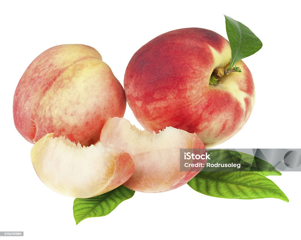 Fresh peaches fruits with cut and green leaves isolated Fresh peaches fruits with cut and green leaves isolated on white background. Closeup. Close-up Stock Photo