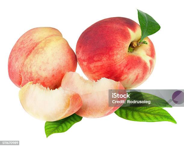 Fresh Peaches Fruits With Cut And Green Leaves Isolated Stock Photo - Download Image Now