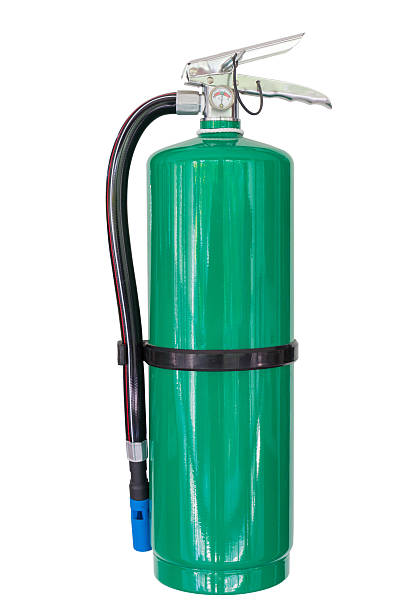 istock Green chemical fire extinguishers isolated on white background 511671112