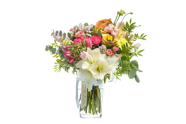 Photo of Beautiful bouquet of bright flowers in vase isolated white