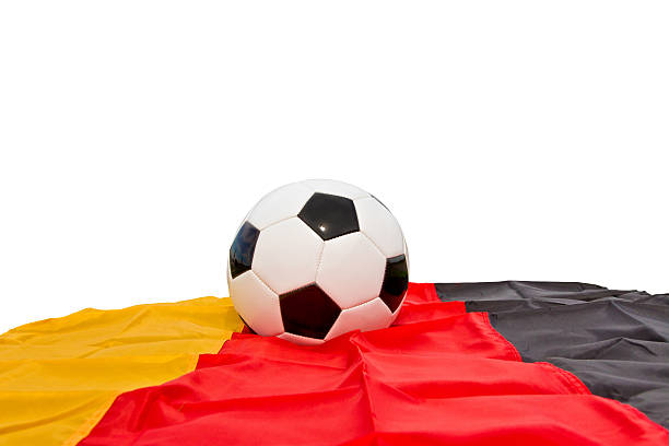 istock Soccer ball on a german flag 511675382