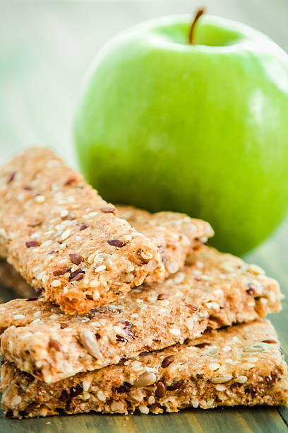 istock Healthy breakfast - Green Apple and Granola Bar 511676204