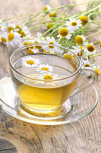 istock Cup of herbal tea with chamomile flowers 511706313