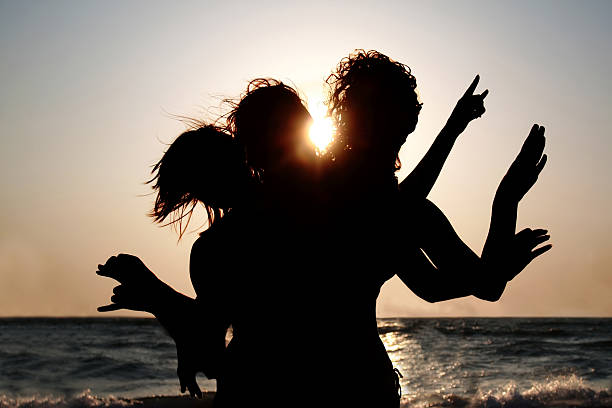 istock Girls silhouettes outdoors 511706425