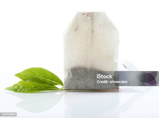 Tea Bag With Leaves Isolated On White Background Stock Photo - Download Image Now - Bag, Breakfast, Caffeine