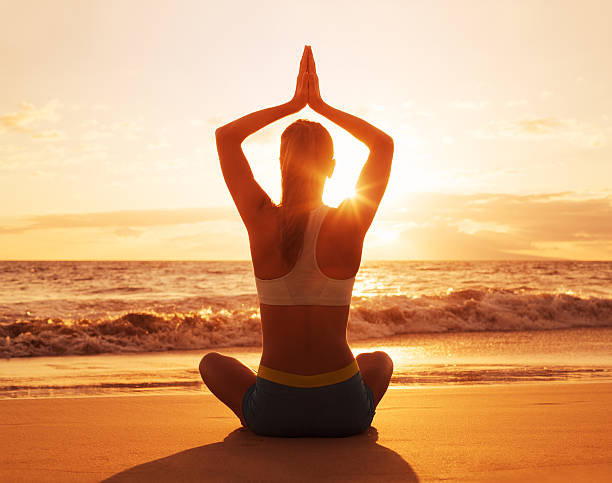 istock Yoga Woman at Sunset 511707815