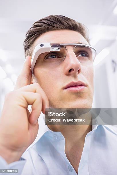 Businessman Standing In The Server Room Stock Photo - Download Image Now - Smart Glasses - Eyewear, 20-29 Years, Adult