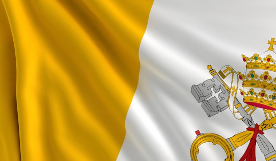 A flag of Vatican City in the wind