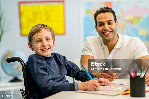 Special Needs And Vulunteer Stock Photo - Download Image Now - Disability, Student, Teacher