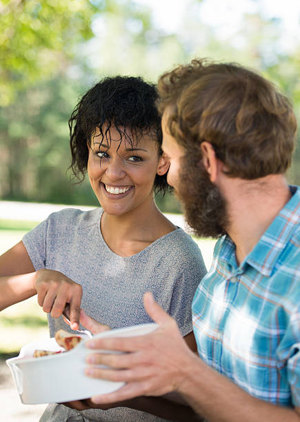 istock Couple Having Dinner Outdoors 511718458