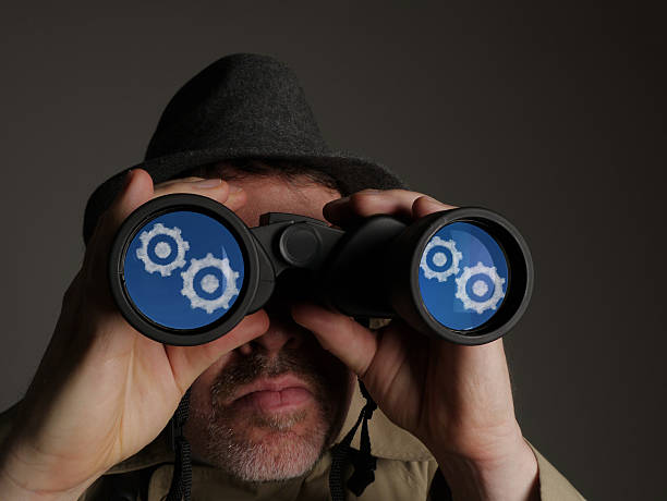 istock Conceptual Image of government agent looking for data 511718580